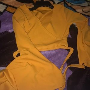 A cross body crop top (didn’t come with tags)